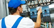 47044186 - electrician worker checking voltage of the electric power switch in fuse board